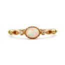Gold plated sterling silver ring with oval synthetic opal and cubic zirconia accents