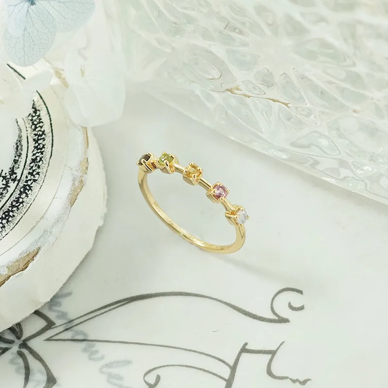 14K gold-plated 925 sterling silver dainty stacking ring set with five natural round-cut gemstones including moonstone, tourmaline, citrine, peridot, and smoky quartz