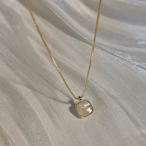 14K gold plated minimalist necklace featuring a square cushion-cut natural mother of pearl shell pendant on a delicate gold box chain
