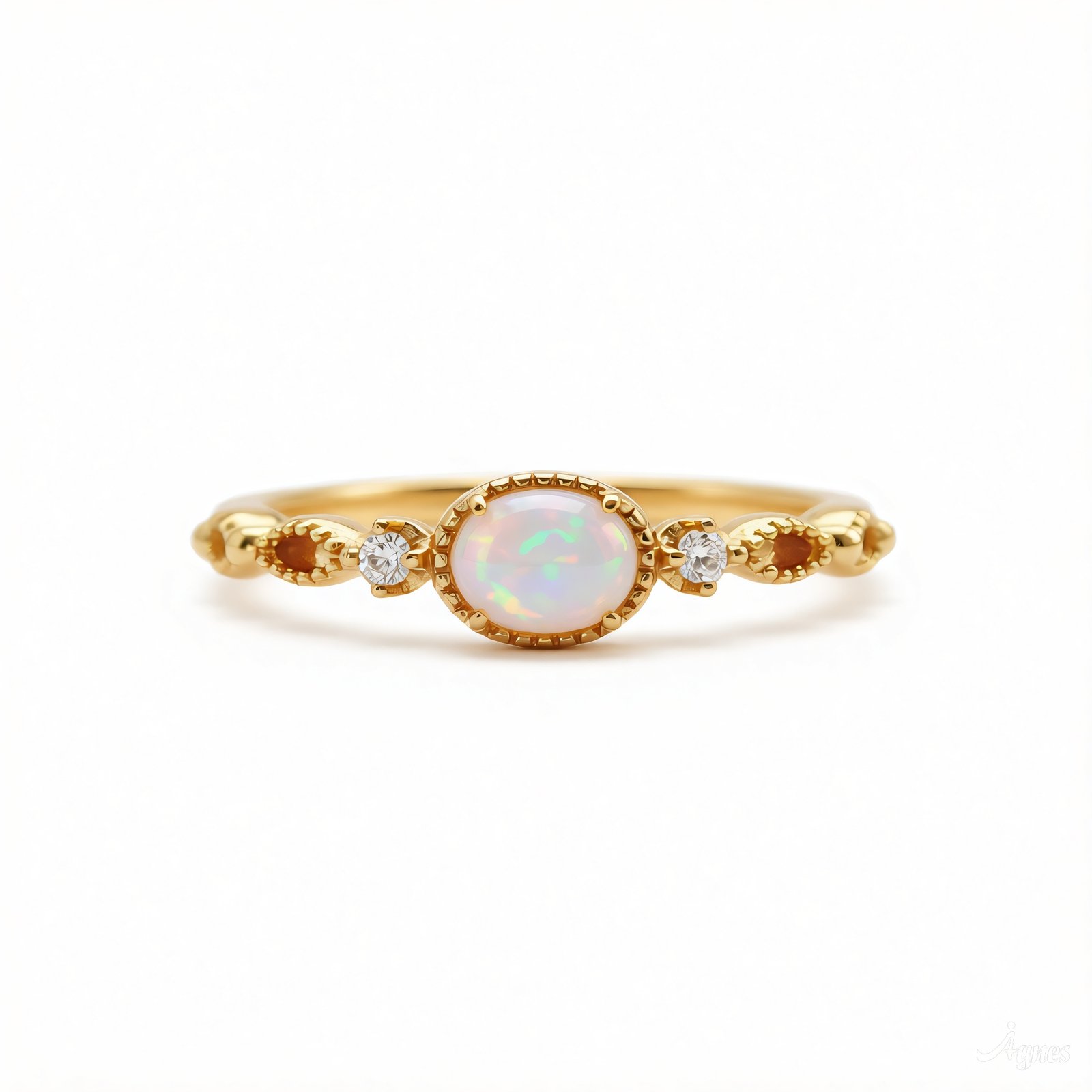 Gold plated sterling silver ring with oval synthetic opal and cubic zirconia accents